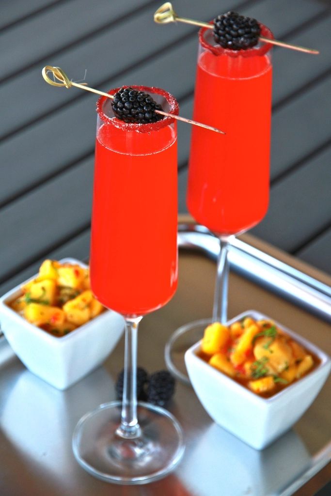 A cocktail being finished at the bar